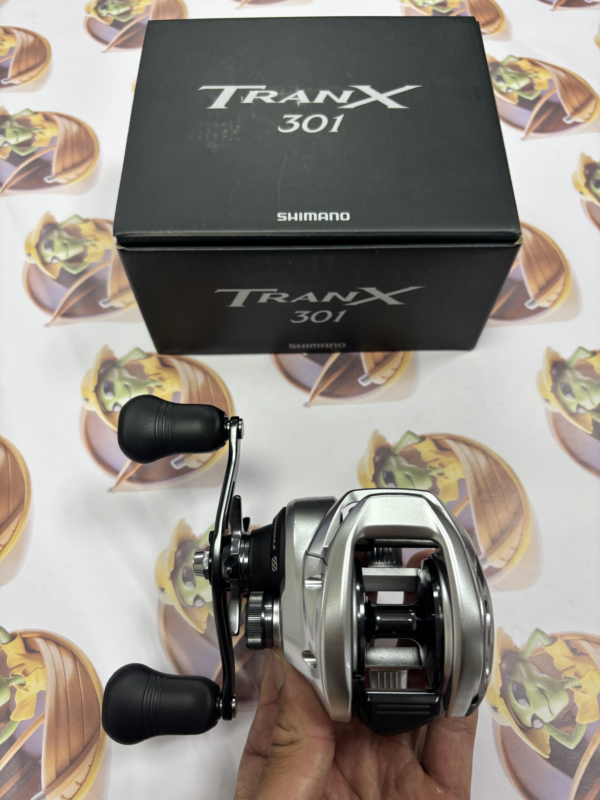 Carretilha Shimano New Tranx B 301 - Imagem 2