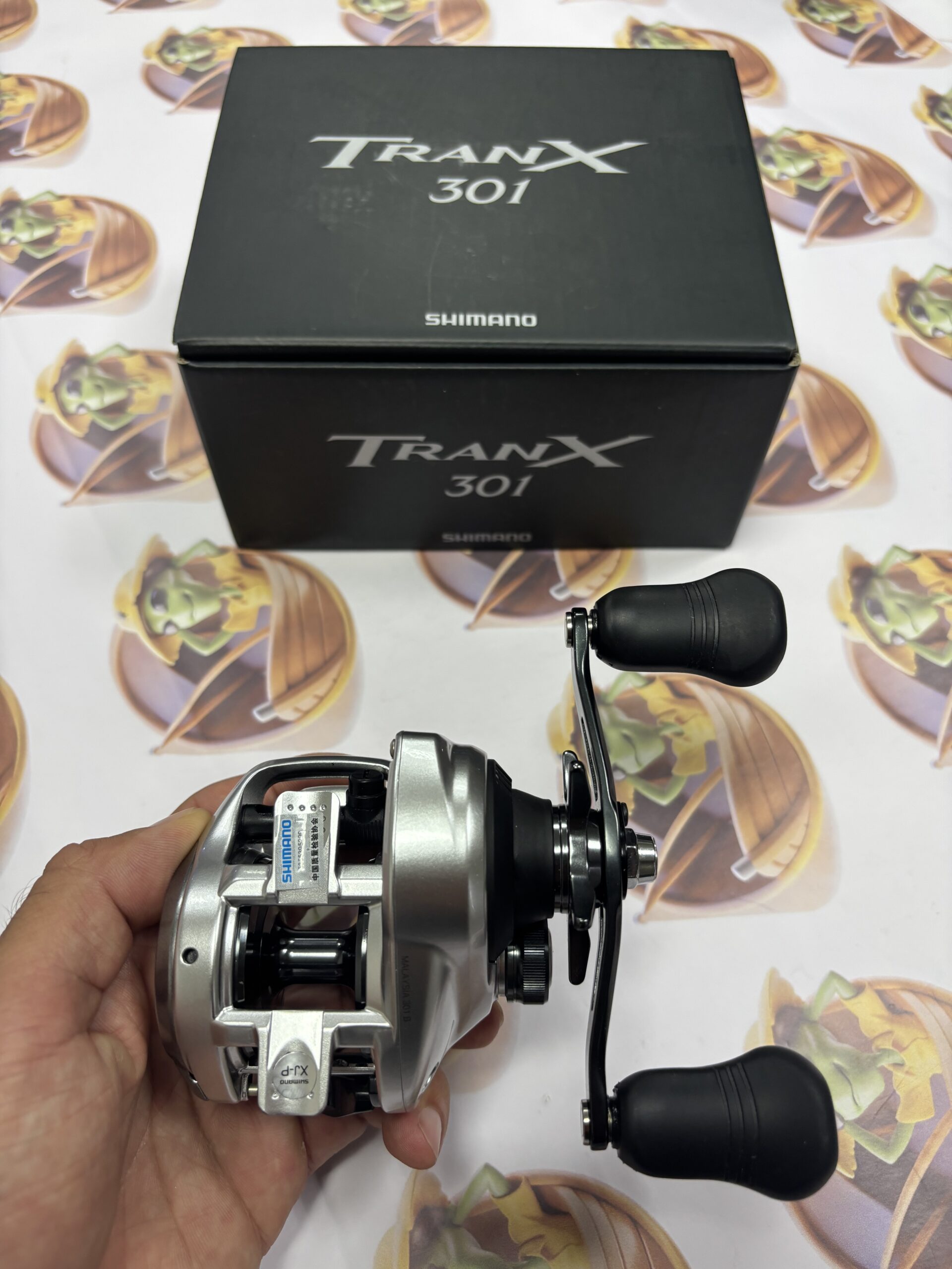 Carretilha Shimano New Tranx B 301 - Imagem 5